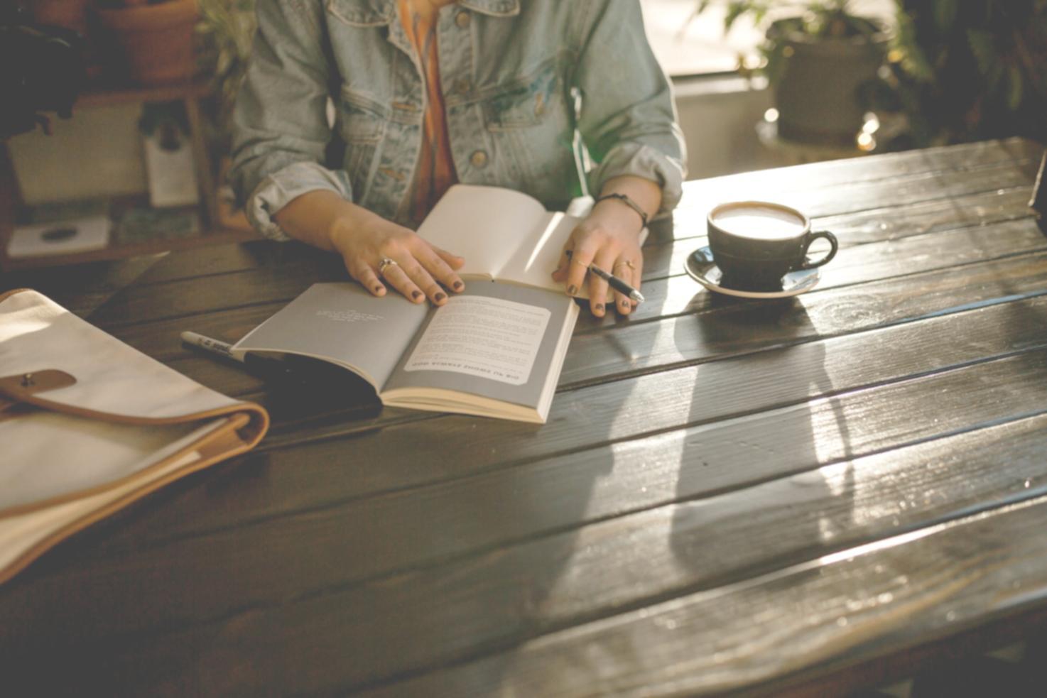 Students analyzing financial data and budget spreadsheets during project workshop